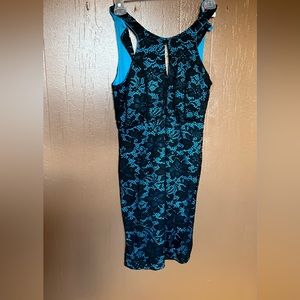 Turquoise and black lace dress
